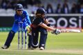 England's Lauren Winfield is bowled by India's Rajeshwari Gayakwad during the Women's World Cup Final at Lord's on Sunday.