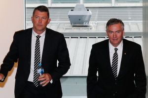 Outgoing Collingwood Magpies AFL CEO Gary Pert (L) arrives to announce his resignation alongside President Eddie McGuire.