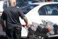 Australia's biggest supermarkets give away billions of plastic bags a year.