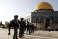 Israeli border police officers stand near the Dome of the Rock  in the al-Aqsa Mosque compound in Jerusalem's Old City.