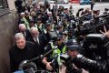 Cardinal George Pell to leaves the Melbourne Magistrates Court. 