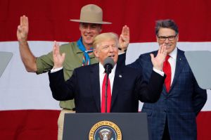 President DonaldTrump, front left, gestures as former boys scouts, Interior Secretary Ryan Zinke, left, Energy Secretary ...