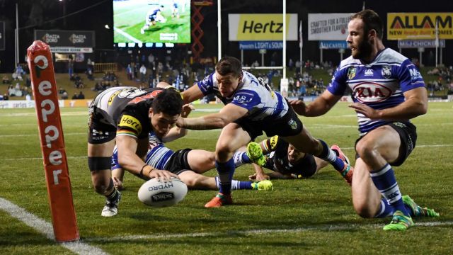 Try time: Dallin Watene-Zelezniak touches down to give Penrith the lead in the second half.