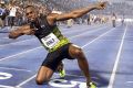 Usain Bolt celebrates after winning the "Salute to a Legend " 100 metres.