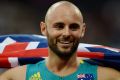 Scott Reardon celebrates after winning the men's 100m T42 final at the World ParaAthletics Championships in London on Monday.