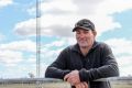 Queensland farmer Andrew Sevil with his 53-metre tower.