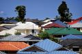 Sydney's house prices were flat in the week but monthly growth in prices has slowed from 3.1 per cent to 2.1 per cent.