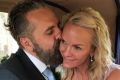 Keith Tyson kisses his new wife, Lis Murdoch, daughter of Rupert Murdoch.