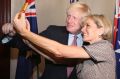 British Foreign Secretary Boris Johnson has a selfie with Australian Foreign Minister Julie Bishop ahead of their ...