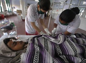 A Hepatitis-B patient Bharat Prajapati, 21, receives medical treatment at an isolation ward of the Civil hospital in Ahmadabad, India, Thursday, Feb. 19, 2009. Five more Hepatitis deaths were reported on Wednesday in north Gujarat, taking the toll to 24 in less than a fortnight, district health officials said, according to a news a