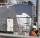 A tram is seen covered in plastic at Randwick Racecourse station construction site in Sydney.