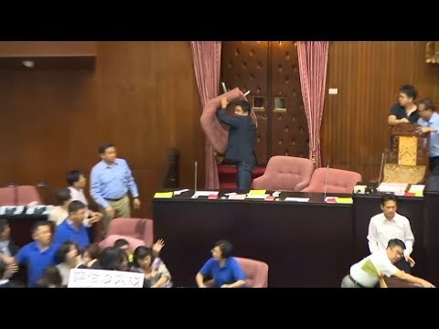 Taiwanese parliament broke out into a water balloon and chair-throwing brawl