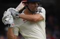 Alastair Cook batted through a rain-interrupted day.