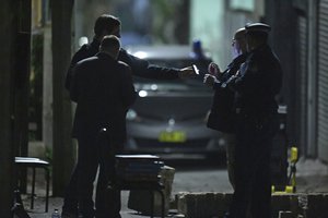 Australian Federal Police and NSW Police officers work in the Surry Hills suburb of Sydney, Australia on Saturday, July 29, 2017.