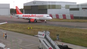 File - A low-cost EasyJet aeroplane prepares for take-off.