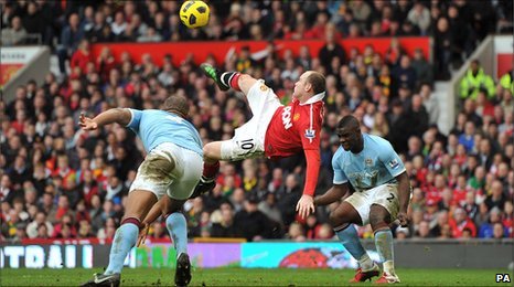 Wayne Rooney scores with an overhead volley