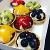 Bite size assorted mini fruit tarts are available for order. #partyfoods #minifoods #fruittarts #wooloowarepatisserie