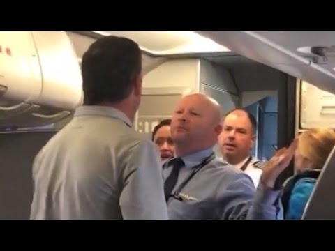 American Airlines employee to passenger: Hit me