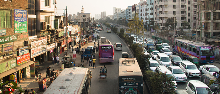 Street with many vehicles in the center of Dhaka in Bangladesh