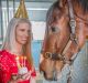 Ex-jockey Chynna Marston brings a birthday cake to Ralph, aka Fell Swoop to celebrate his birthday and the official ...