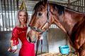 Ex-jockey Chynna Marston brings a birthday cake to Ralph, aka Fell Swoop to celebrate his birthday and the official ...