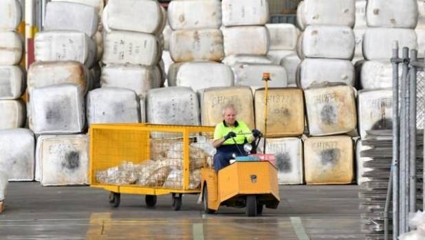 Baled up. Thousands of wool bales go under the hammer at Melbourne wool sales.