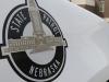 A vehicle with the Nebraska State Patrol logo is parked in a state patrol facility in Omaha, Neb., Wednesday, Aug. 2, 2017. A federal lawsuit accuses the Nebraska State Patrol that it has for years forced female recruits to submit to invasive, medically unnecessary pelvic exams performed by a male doctor before they can be hired. (AP Photo/Nati Harnik)