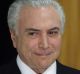 Brazilian President Michel Temer arrives to give a statement in Brasilia, after surviving a key congressional vote that ...