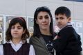 Georgi York with her children Ellie 10, Zac 8 and Phoenix, 6, outside Anzac Park Public School in Cammeray.