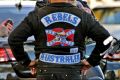 A Rebels Outlaw member will face court on charges of family violence.