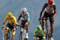 Survival of the fittest: Darwin Atapuma of Colombia leads a group of riders including race leader Chris Froome over the Alps.