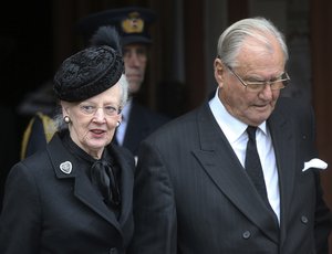 Queen Margrethe of Denmark and her husband Henrik leave the protestant church after a funeral service for the late husband of her sister Princess Benedikte, Prince Richard of Sayn-Wittgenstein-Berleburg, in Bad Berleburg, Germany, Tuesday, March 21, 2017.(AP Photo/Michael Probst)