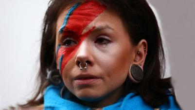 Bowie fan with tear  (Photo by Carl Court/Getty Images)