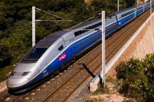 Anth?or, France, September 27, 2014 : A french high speed train TGV running over a viaduct alongside mediterranean ...