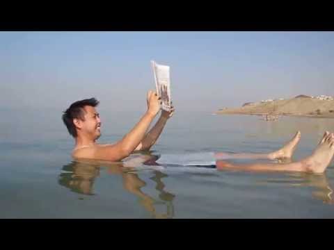 Reading the Jordan Times in the Dead Sea