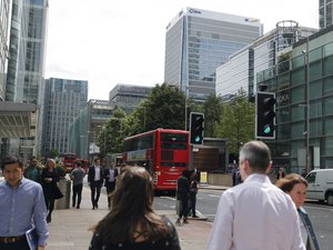 The headquarters building of the European Medicines Agency, EMA,in background right, in London, Friday, July 28, 2017. The EMA will be relocated from Britain, and European Union cities are currently applying to host the European Banking Authority and EMA headquarters in the future