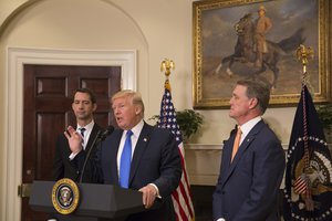 President Donald J. Trump speaks to the media alongside Senator Tom Cotton and Senator David Perdue, at the White House, Washington, August 2, 2017.