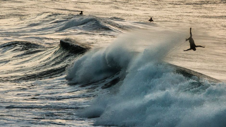 Surfers brave the large and heavy sets of waves coming onto Bondi Beach, on August 2, 2017, Sydney. Photo:Jessica Hromas