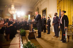 File - President Donald J. Trump awards the Medal of Valor, July 27, 2017.