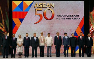 Philippine President Rodrigo Duterte center, poses with ASEAN Foreign Ministers and their representatives at the closing ceremony of the 50th ASEAN Foreign Ministers Meeting (AMM) and its 50th Grand Celebration Tuesday Aug.8, 2017 at the Philippine International Convention Center in suburban Pasay city southeast of Manila, Philippines.(AP Photo/Bullit Marquez)