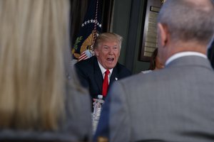 President Donald Trump delivers a statement on North Korea during a briefing on the opioid crisis at Trump National Golf Club, Tuesday, Aug. 8, 2017, in Bedminster, N.J.