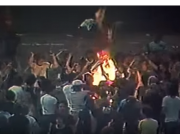 A crowd lights a bonfire of disco records at Comiskey Park