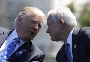 President Donald Trump speaks privately with Attorney General Jeff Sessions at the White House, Friday, May 12, 2017, in Washington.