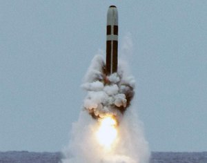 File - An unarmed Trident II D5 missile launches from the Ohio-class fleet ballistic-missile submarine USS Maryland off the coast of Florida. The test launch was part of the U.S. Navy Strategic Systems Programs demonstration and shakedown operation certification process.