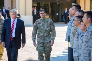 File -  President Donald J. Trump and Army Gen. Joseph L. Votel, commander of U.S. Central Command, spend a few minutes with troops on their way to a news briefing at MacDill Air Force Base, Fla., Feb. 6, 2017.