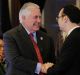 US State Secretary Rex Tillerson, left, is greeted by Philippine Foreign Affairs Secretary Allan Peter Cayetano in Manila.