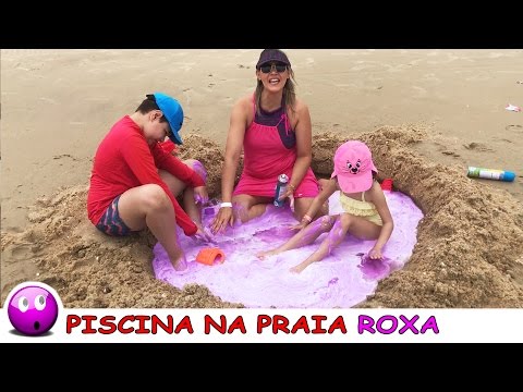 PISCINA GIGANTE NA AREIA DA PRAIA COM CORANTE E ESPUMA ROXA