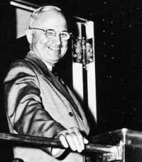 Here's Harry S. Truman, looking awfully proud of his damn self.