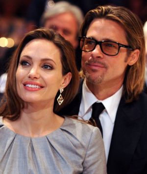 Brad Pitt and Angelina attend the charity event Cinema for Peace in 2012.