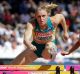 Sally Pearson wins her 100m hurdles first round heat in London.